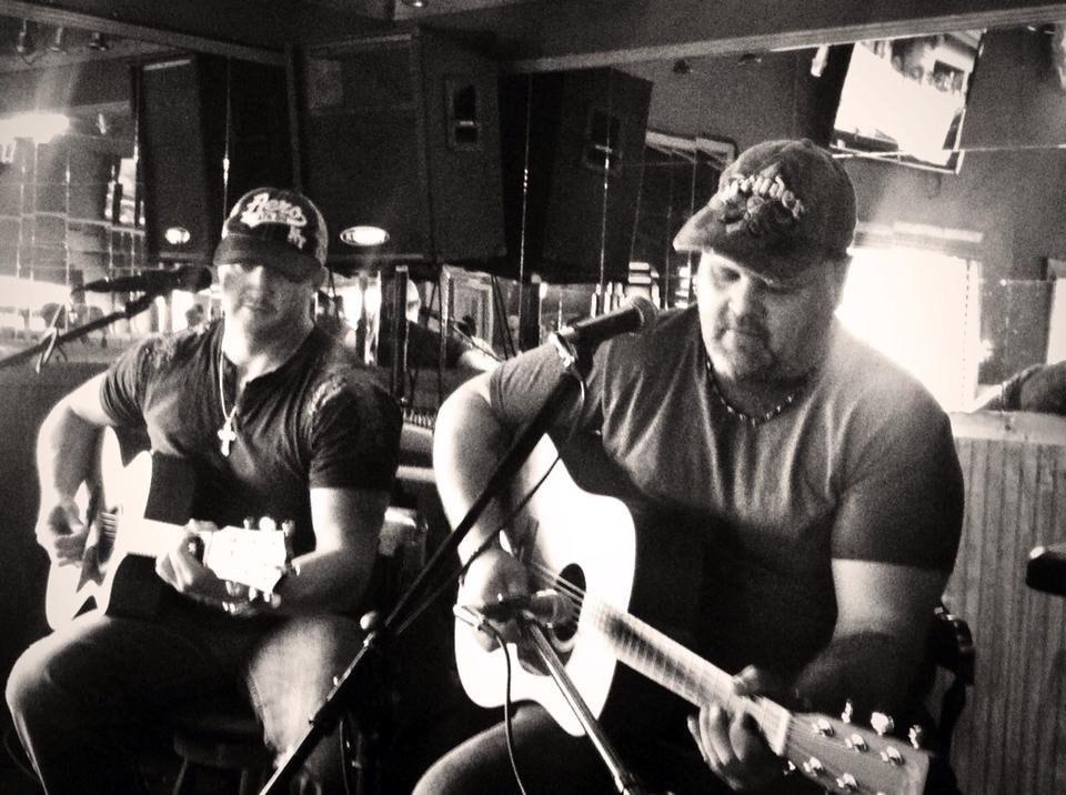 Marc Kenney and Jimmy Waters performing acoustic duo, black and white