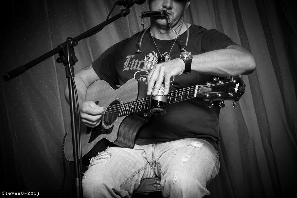 Marc Kenney playing bottleneck slide on Taylor guitar with harmonica, black and white — StevenO 2013