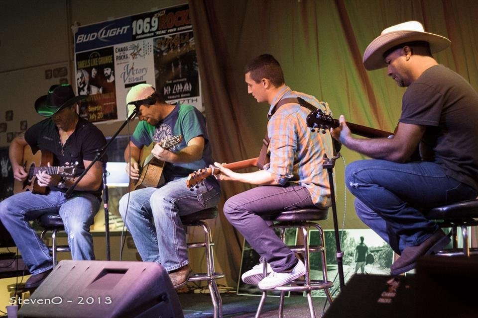Marc Kenney and band performing at a radio station event — StevenO 2013